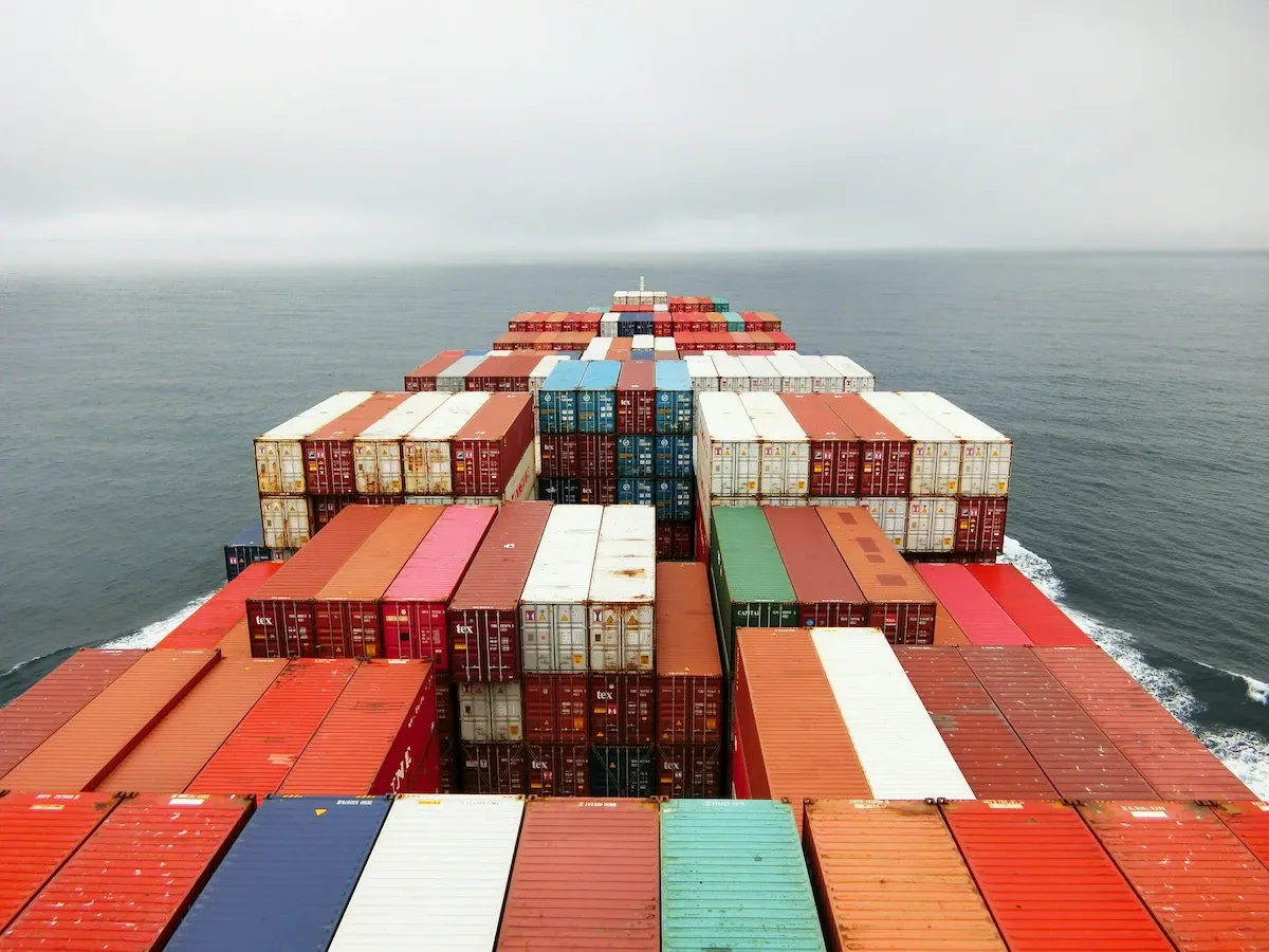 Container vessel loaded with cargo navigating at sea